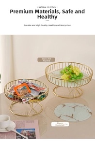 Close-up of golden iron frame and marble-patterned glass tray for home decor