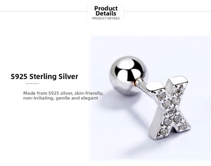 Detail of S925 sterling silver X-shaped letter stud earring with sparkling cubic zirconia