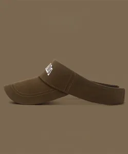 Detail of embroidered letters on a brushed canvas sun visor with side color options