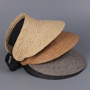 Detailed comparison of four straw sun visors in beige, khaki, dark grey and black colors