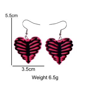 Magenta heart acrylic earrings with rib cage skeleton print for Halloween style