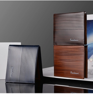 Close-up of men's bifold wallets in navy, coffee, and tan with wood grain texture