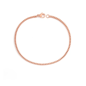 Detail of rose gold box chain bracelet with secure lobster clasp on white background