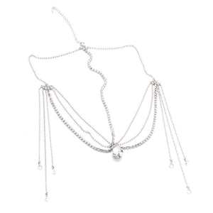 Detailed view of silver forehead chain with drop crystal and rhinestone tassels