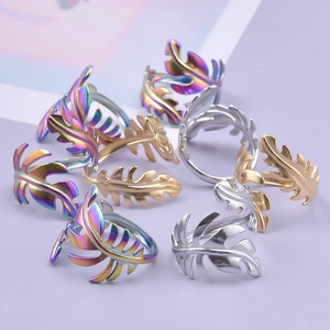 Minimalist adjustable stainless steel leaf rings in gold, silver and rainbow finishes