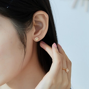 Elegant gold star-shaped opal stud earrings and matching ring set for women