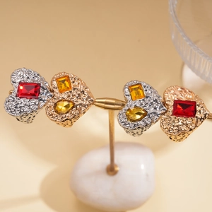 Set of four vintage resin heart and geometric open rings in gold and silver finish