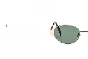 Details von Sonnenbrille mit Goldmetallrahmen, grünen Gläsern und Nasenpad-Handwerk