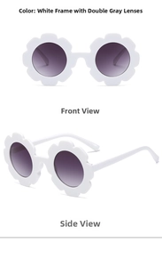 Detailed front and side views of white flower-shaped children's sunglasses with gray lenses