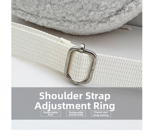 Close-up of white fleece bag adjustable woven strap with durable silver metal ring