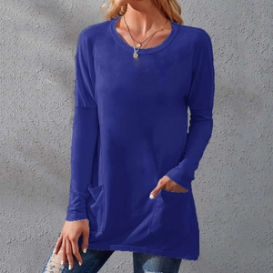 Detail view of deep blue long sleeve tunic showing round neck and side pocket features