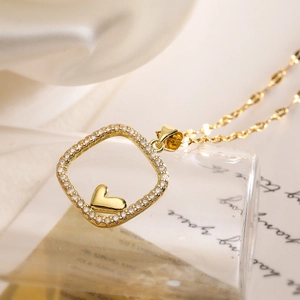 18K gold plated necklace featuring a geometric square frame with zircon and a solid heart