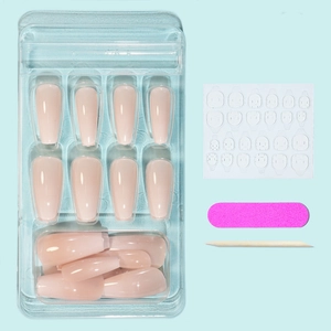 Kit with nude coffin press-on nails, jelly glue, mini nail file, and wooden cuticle stick