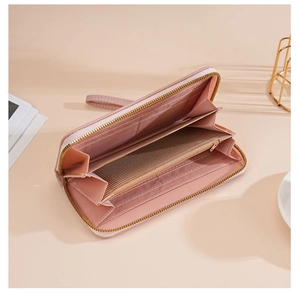 Internal view of pink lychee pattern long wallet with multiple card slots and zip pocket