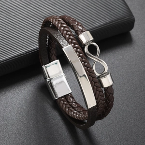 Men's brown braided leather bracelet featuring a silver infinity charm and magnetic clasp