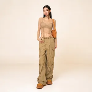 Retro khaki parachute pants with adjustable wide legs and multi-pocket cargo design
