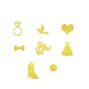 Golden glitter wedding table confetti set with diamond ring and heart shapes for bridal showers