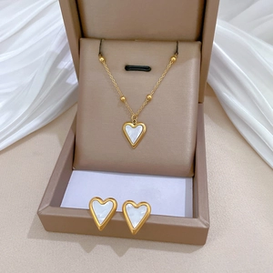 Elegant gold-plated titanium necklace and heart-shaped shell earrings in a gift box