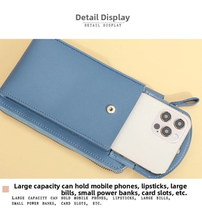 Macro detail showing spacious interior of a blue crossbody phone bag with card slots