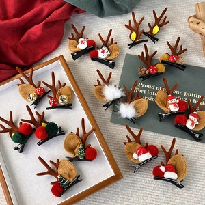Details von Weihnachts-Rentier-Haarspangen mit festlichem Filz und Glockendekor