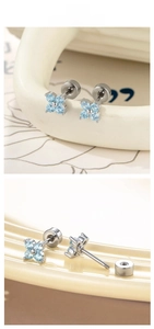 Detailed view of light blue zircon flower studs with secure silver screw-back closure