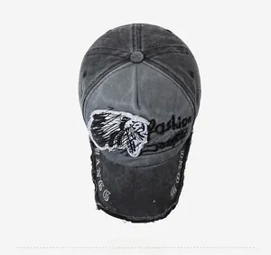 Top view of vintage washed charcoal baseball cap with embroidery and distressed brim