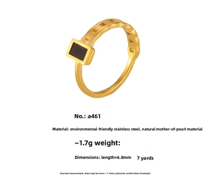 Detail of gold-plated stainless steel ring featuring rectangular black mother of pearl inlay