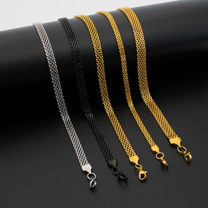 Macro view of mesh chain bracelets with lobster clasp in gold, black and silver finish