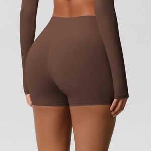 Detail view of high waist yoga shorts showing back seam construction and lifting effect