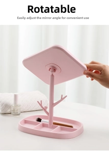 Pink rotatable tabletop makeup mirror with jewelry storage hooks and divided base tray