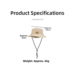 Detail of beige sun hat featuring adjustable chin strap and brown leather patch