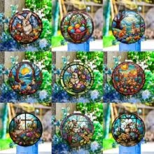 Grid view of 9 Easter hanging ornaments with stained glass style rabbit and egg designs