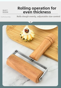 Macro view of beech wood rolling pin with stainless steel bracket on marble surface