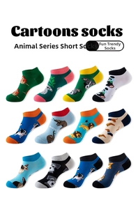 Flat lay of 12 cartoon animal ankle socks featuring koala, panda, and corgi patterns