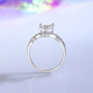 Luxurious S925 sterling silver crown ring featuring a large round moissanite and side stones