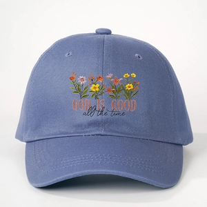 Classic navy cotton baseball cap featuring floral embroidery and God Is Good phrase