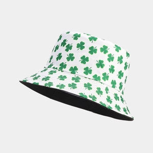 White bucket hat with green clover print and black lining for sun protection