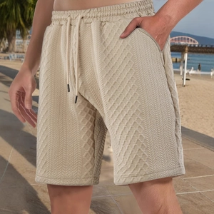 Men's retro loose casual shorts in light khaki textured fabric with elastic drawstring waist