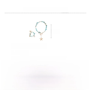Detail of seashell and starfish necklace set featuring blue stones and gold alloy accents