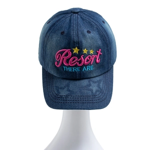 Blue washed denim baseball cap with pink Resort embroidery and three yellow stars