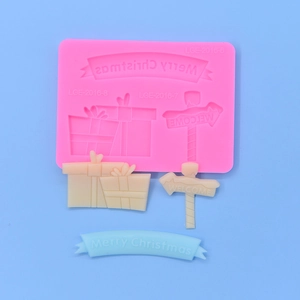 Pink Christmas silicone mold set featuring gift boxes and Merry Christmas banner signs