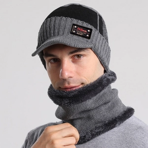 Close-up of men's knit beanie and neck warmer with thick fleece lining for winter warmth