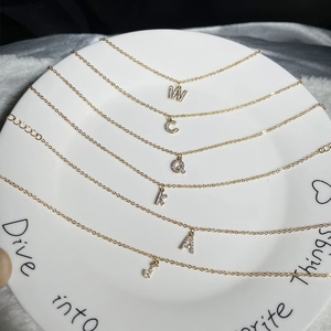 Elegant 18K gold plated zircon alphabet bracelets set with initials in a minimalist design