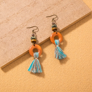 Bohemian long tassel earrings with wooden ring and colorful fringe in retro style
