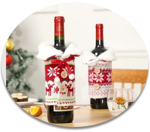 Detail of Christmas knitted wine bottle covers with snowflakes, elk patterns and buttons