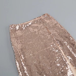 Detailed view of rose gold sequins on the high-slit maxi skirt and cropped top set