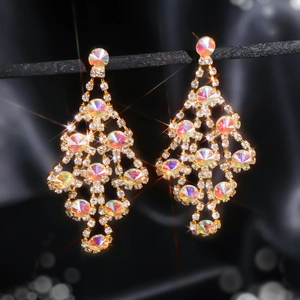 Elegant long gold drop earrings with rainbow rhinestones and starburst sparkle