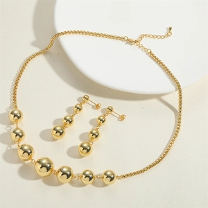 Polished 14K gold plated bead necklace and matching drop earrings jewelry set