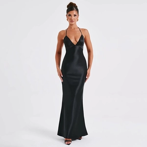 Detail of elegant black satin evening gown featuring a deep V-neck and halter design