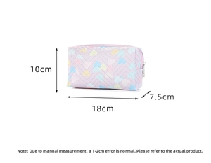 Detail view of purple heart pattern cosmetic bag with V-shaped quilting and size dimensions